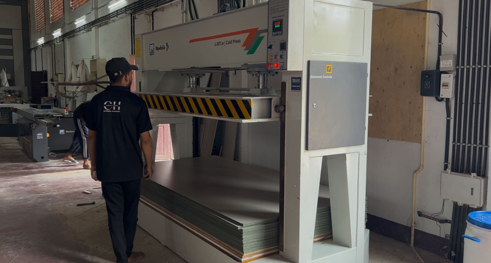 Factory staff working on premium kitchen units